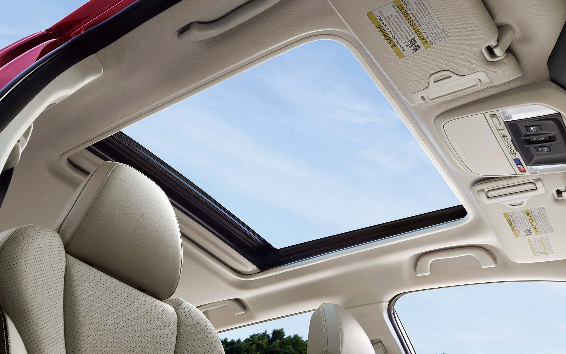 A view through the power sliding panoramic moonroof on the 2022 Forester Sport. | Dalton Subaru in National City CA