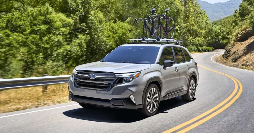 Thule platform-style carrier holds 2 bikes on the 2026 Subaru Forester roof